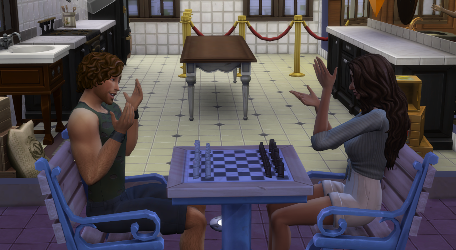 A Sims 4 screenshot, Elmira and Sawyer Snow sat down with a chess table between them talking happily.