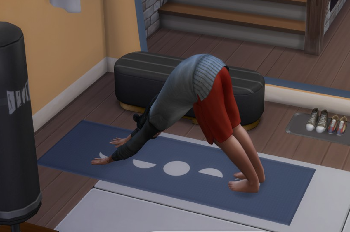 A Sims 4 screenshot, Salim doing down dog position on a little yoga mat.